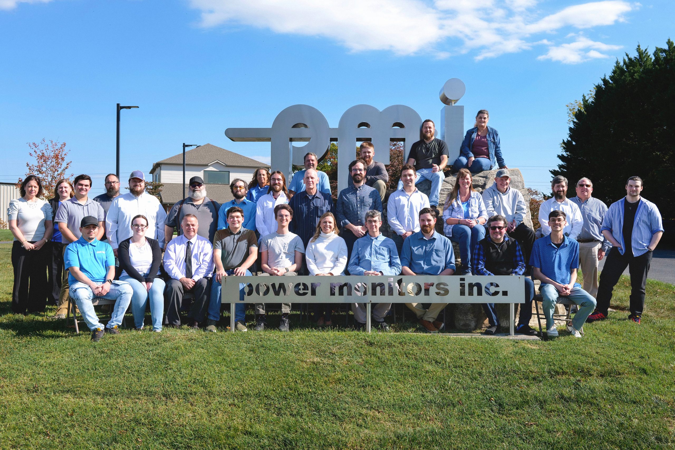 The Power Monitors, Inc. team — engineers, designers, and manufacturing staff — gathered at PMI headquarters in Mt. Crawford, Virginia, 2025